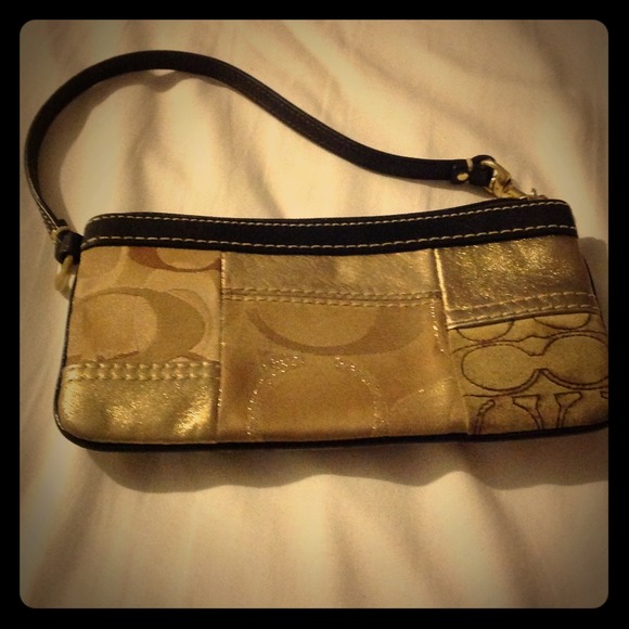 Authentic  Coach gold wristlet