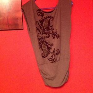 Brown short sleeve shirt with floral design