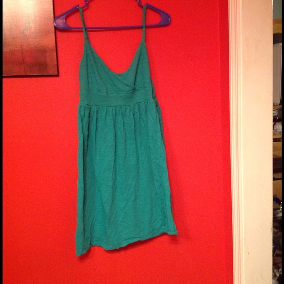 Turquoise spaghetti strap dress.