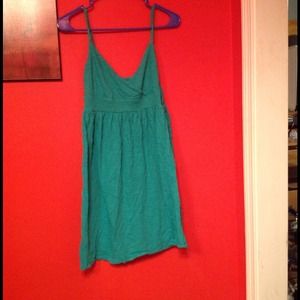 Turquoise spaghetti strap dress.