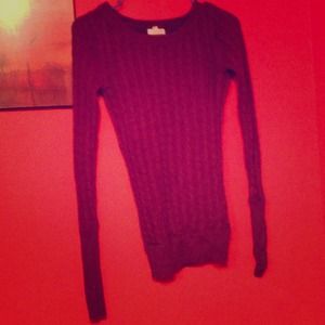 Dark purple sweater.