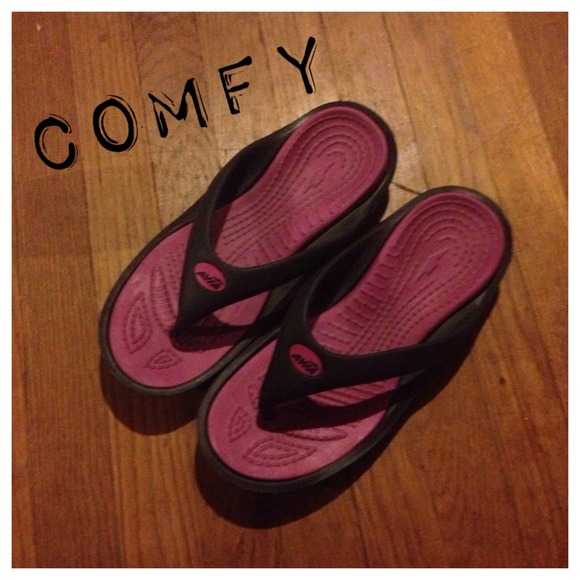 Purple and black sandals.