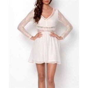 Beautiful White dress with lace sleeves and back