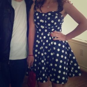 Short blue and white polka dotted dress.