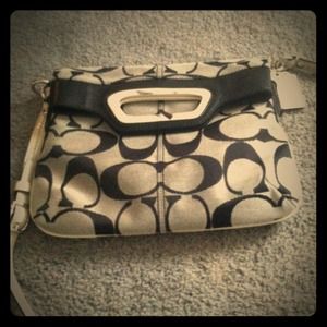 Black and gray cross body Coach bag.