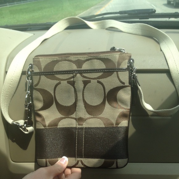 On HOLD authentic coach brown crossbody purse.