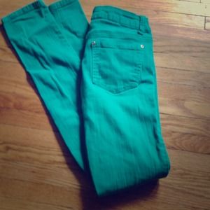 HOLD Teal green skinnys sz 24