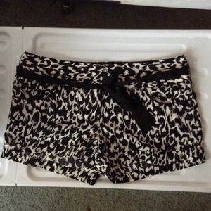 Animal Print shorts with black ribbon belt.