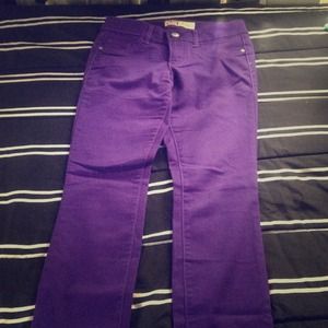 Purple low rise skinny jeans.