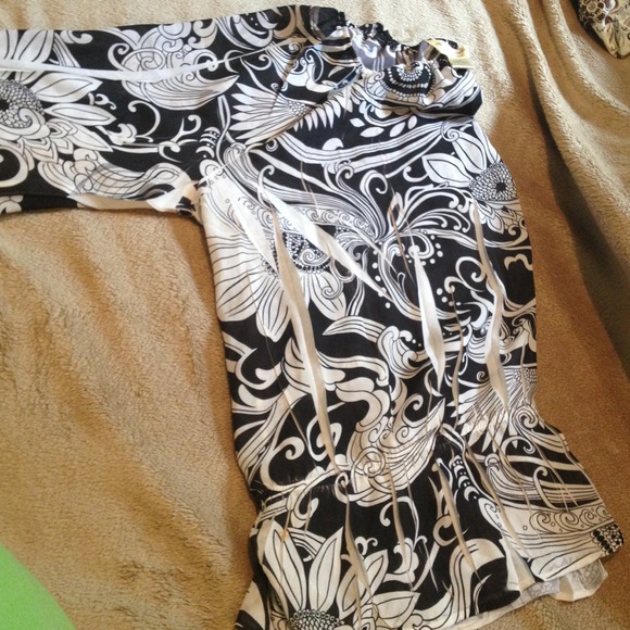Translucent black and white dress shirt.