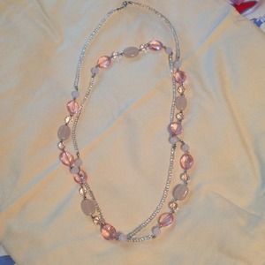 Long beaded necklace with clear and pink beads