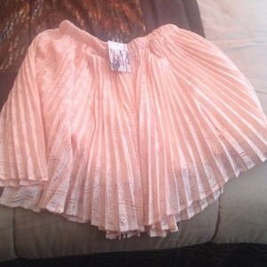 Mini pleaded Lace skirt