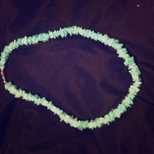 Blue surfer neckless.