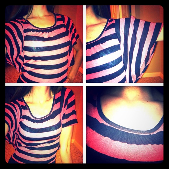 Pink and black striped blouse.