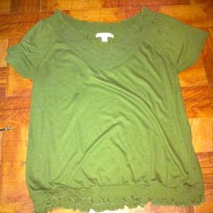 Green top with ruffle design