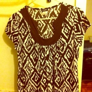 A white and brown top