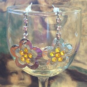 Flower shaped rhinestone & yellow stone earrings.