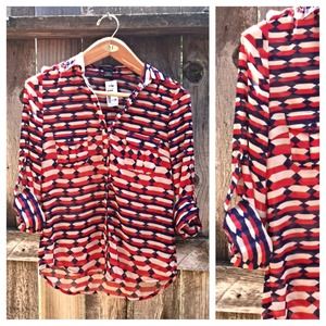 Red, white, and blue patterned shirt.