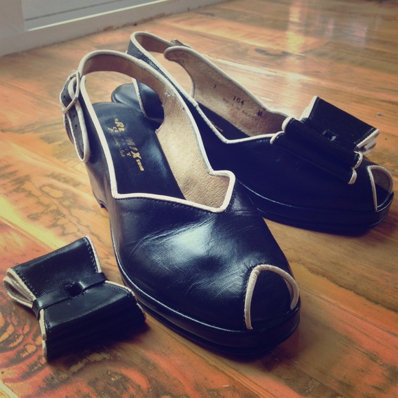 Black leather peep toes; size 7