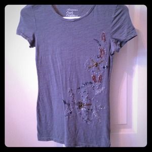 American eagle shirt with beautiful beads on side!