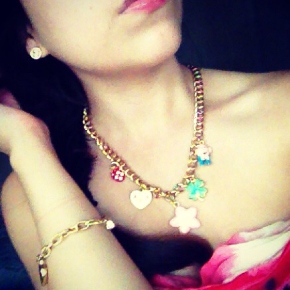 Juicy Couture earrings, bracelet, and chain!:)