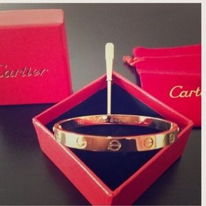 Gold tone screw bangle bracelet