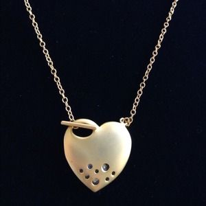 Gold heart necklace.