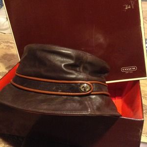 Genuine leather, authentic Coach bucket hat.