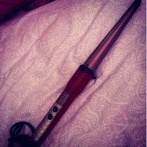 Red Conair you curling wand.