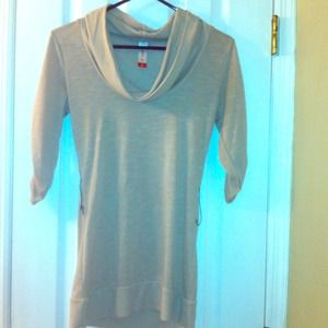 Light brown long shirt, with cheetah belt