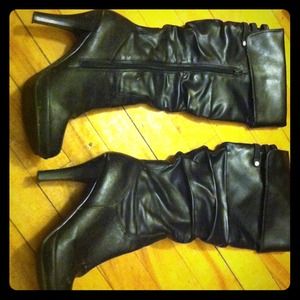 Black boot heels heavily worn