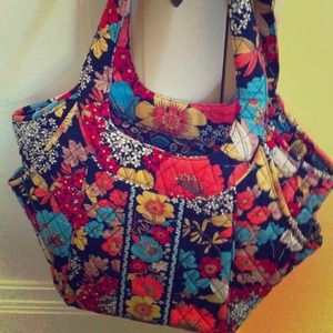 Vera Bradley purse, tech case, and wallet.