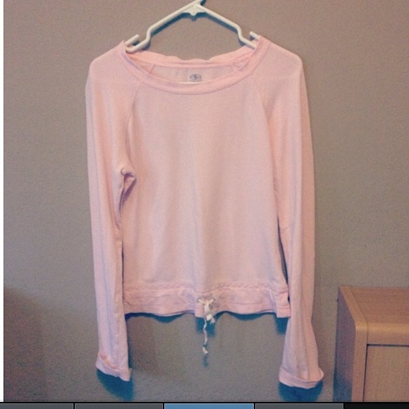 Pink athletic sweater