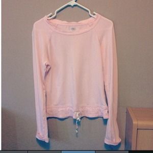 Pink athletic sweater