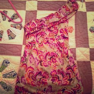 very fun brightly colored one shoulder dress