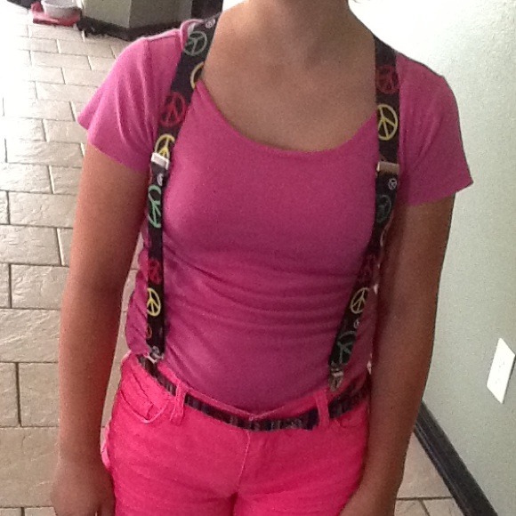 Piece sign suspenders.