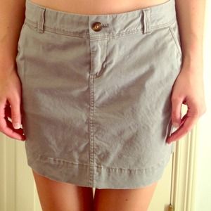 Gray mini skirt.