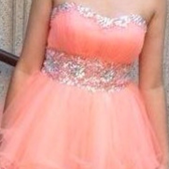 A light pink slik sheik dress