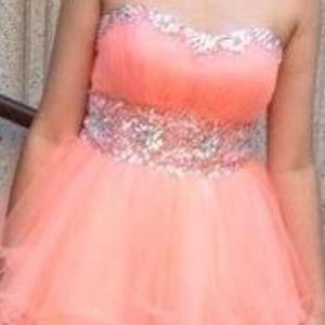 A light pink slik sheik dress