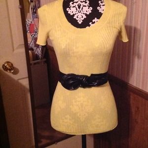 Yellow , low cut short sleeve.