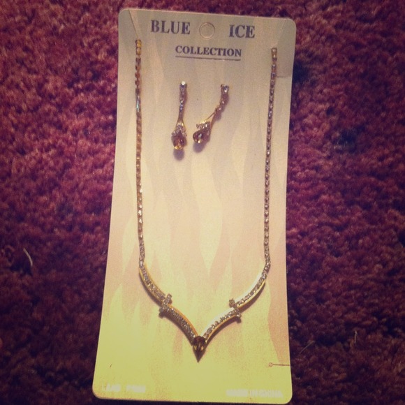 Golden necklace with matching earrings