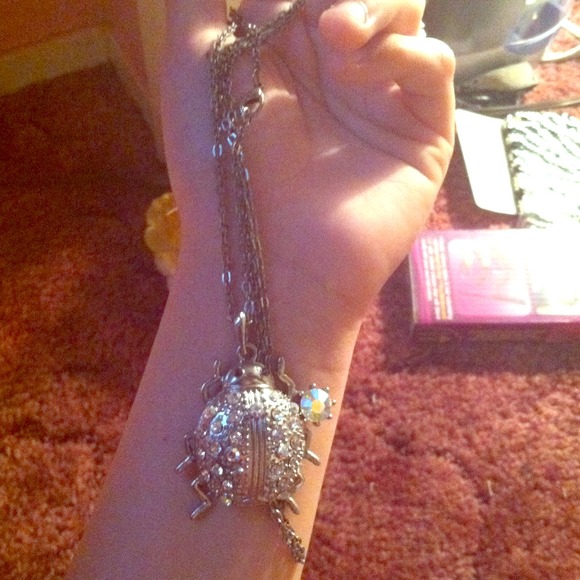 Bug necklace.