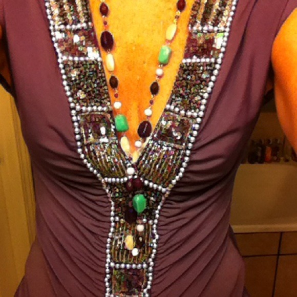 Lets go dancing in this purple shirt and necklace