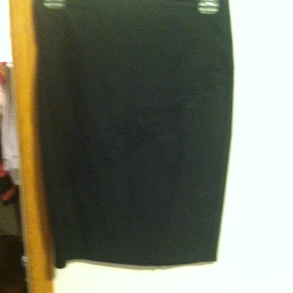 Worn once. Black knee length skirt with lace