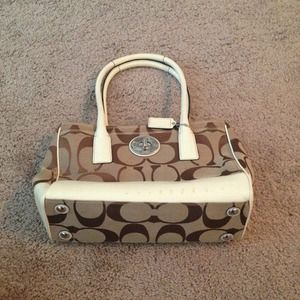 Brown and white Coach Purse