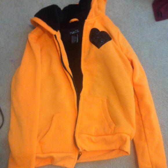 A neon orange sweater