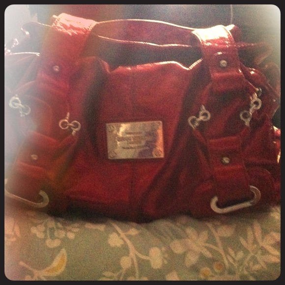A sexy leather red Gianni Versace Couture purse