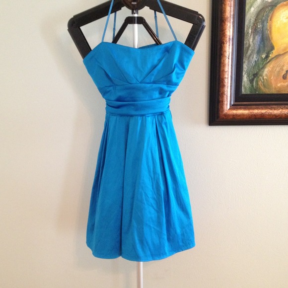 Blue medium Shasa dress. Zip up back with ties.