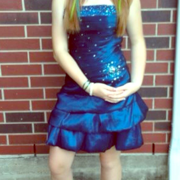 Blue semi sequin strapless dress.