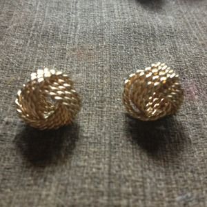 a pair of golden studs